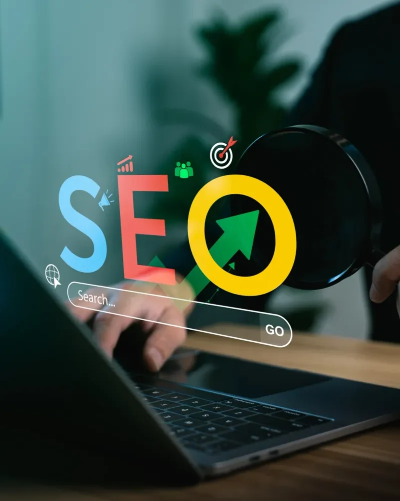 Amplified Audience Partners SEO Services - image of SEO logo and hand on keyboard.